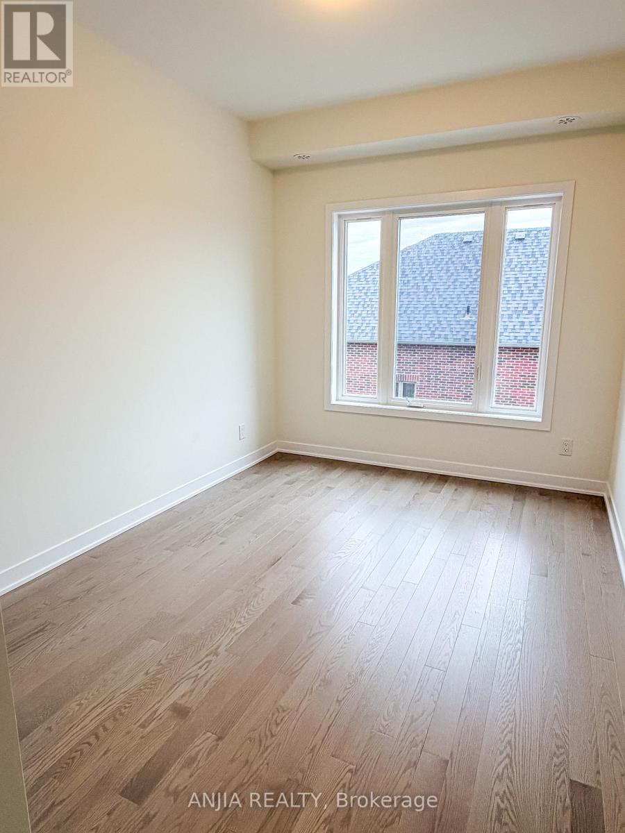 21 Harvey Bunker Crescent, Markham, Ontario  L6C 3K3 - Photo 11 - N12474612