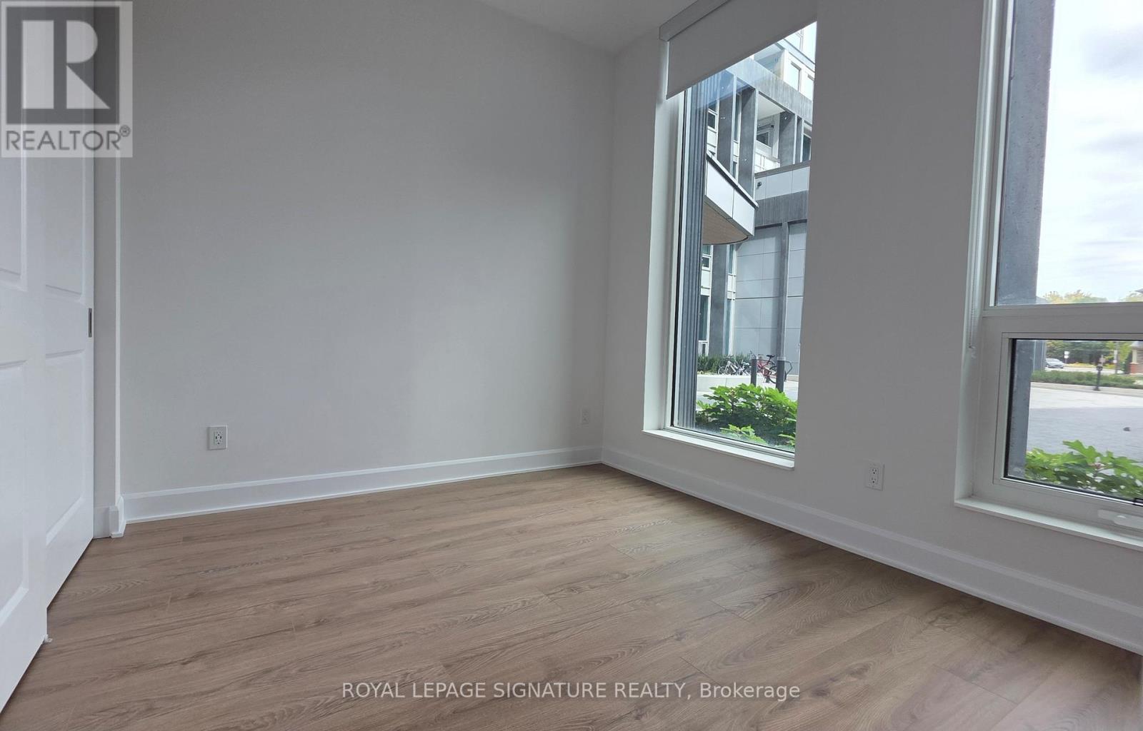 101 - 3240 William Coltson Avenue, Oakville, Ontario  L6H 0X1 - Photo 4 - W12474590