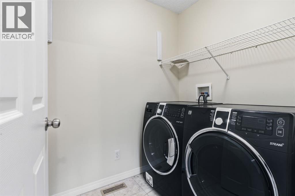 64 Cougarstone Square Sw, Calgary, Alberta  T3H 5J4 - Photo 30 - A2262348
