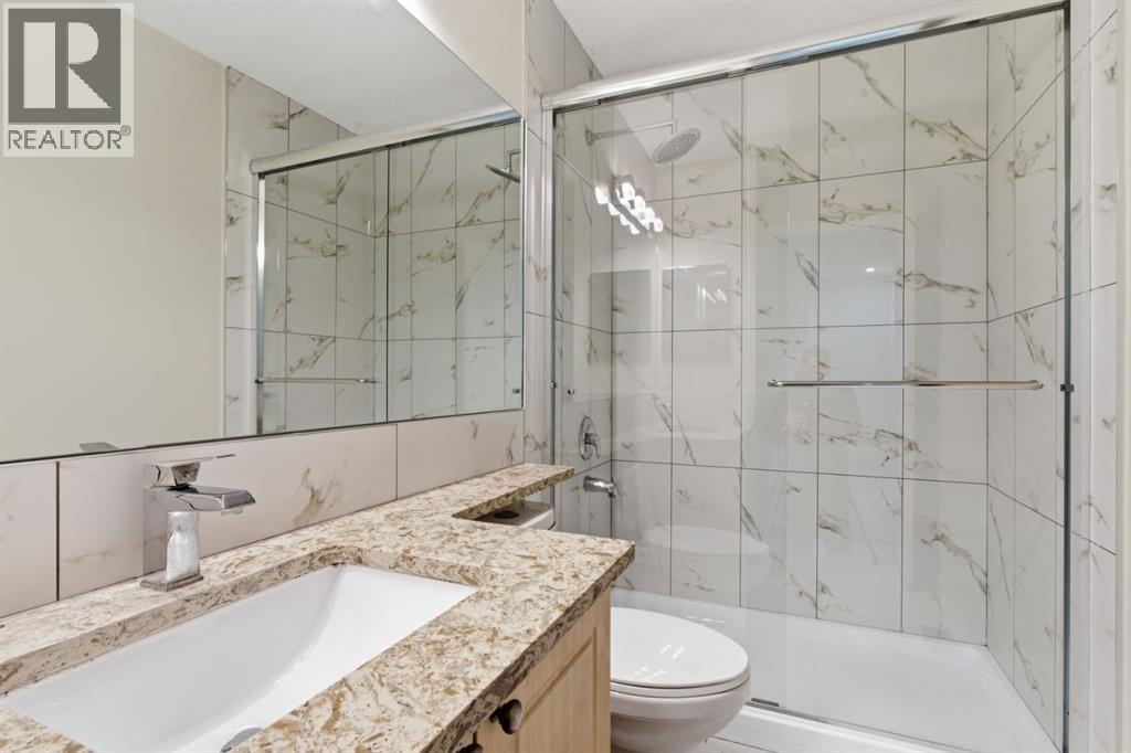 64 Cougarstone Square Sw, Calgary, Alberta  T3H 5J4 - Photo 35 - A2262348