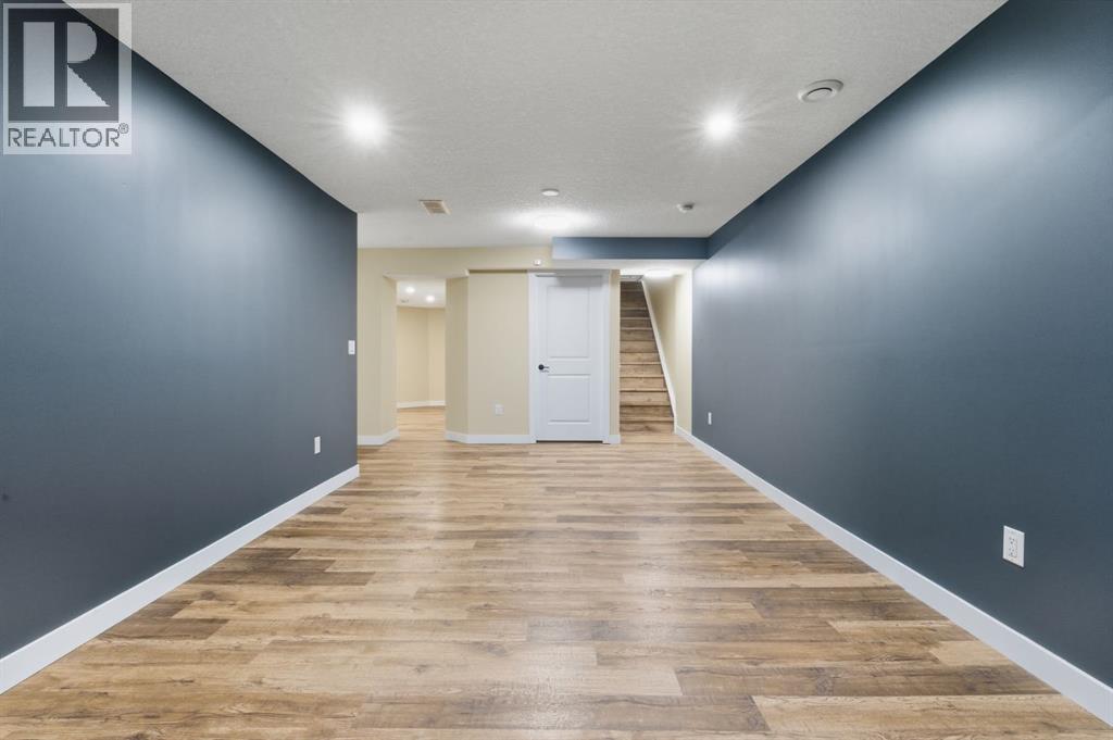 64 Cougarstone Square Sw, Calgary, Alberta  T3H 5J4 - Photo 38 - A2262348
