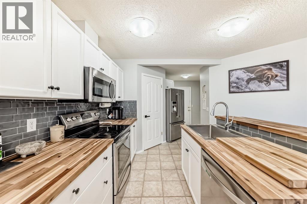 8, 122 Bow Ridge Crescent, Cochrane, Alberta  T4C 1V9 - Photo 8 - A2265241