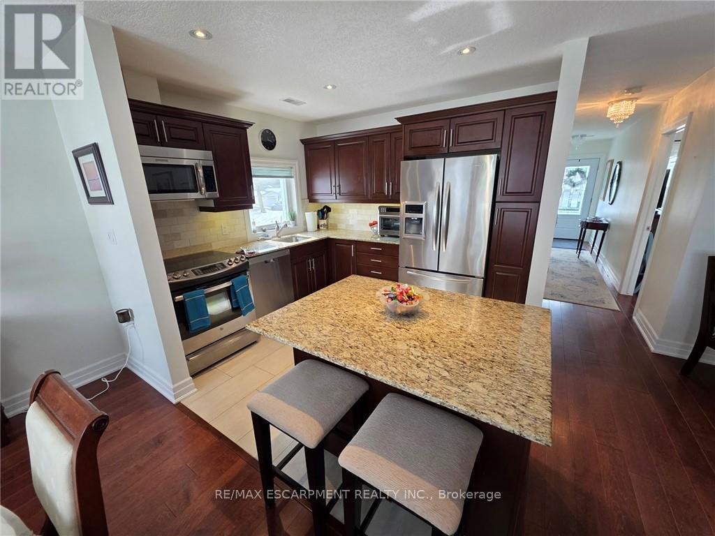 49 Bishop Reding Trail, Hamilton, Ontario  L9B 1T8 - Photo 6 - X12474610
