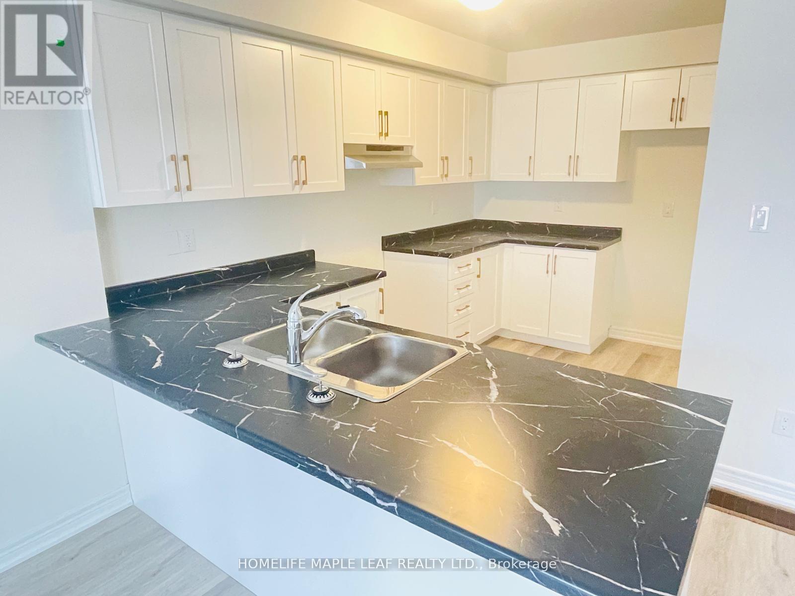 115 - 27 Roxanne Drive, Hamilton, Ontario  L8H 1L9 - Photo 12 - X12474847