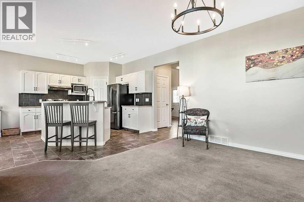 394 Cimarron Boulevard, Okotoks, Alberta  T1S 0A9 - Photo 8 - A2263407