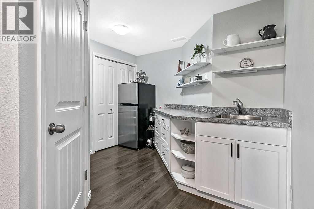 394 Cimarron Boulevard, Okotoks, Alberta  T1S 0A9 - Photo 20 - A2263407
