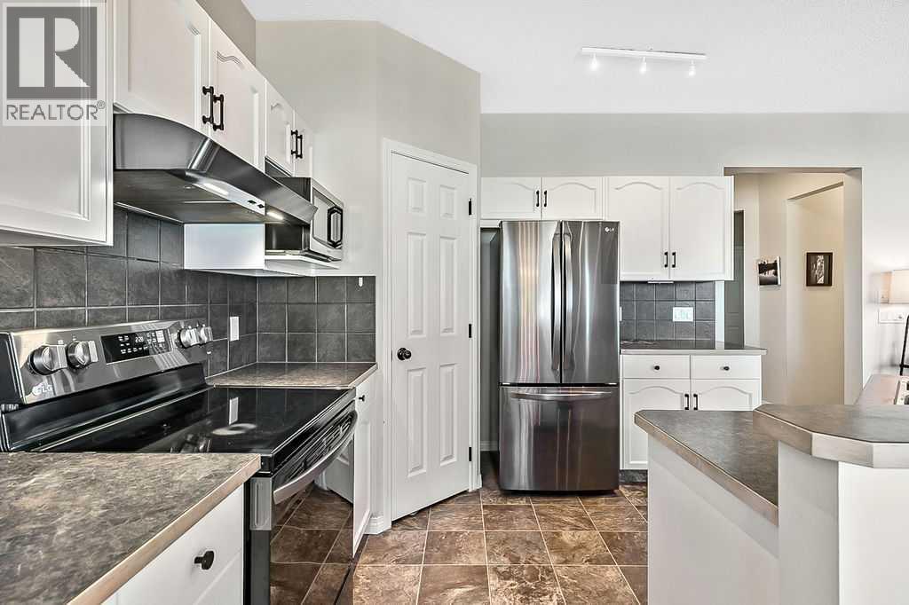 394 Cimarron Boulevard, Okotoks, Alberta  T1S 0A9 - Photo 5 - A2263407