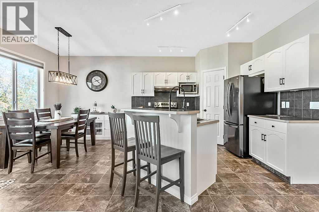 394 Cimarron Boulevard, Okotoks, Alberta  T1S 0A9 - Photo 3 - A2263407