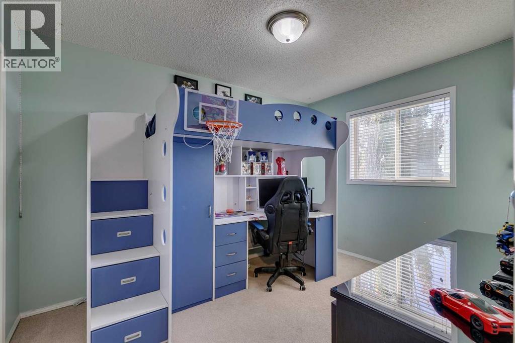 94 Somerglen Close Sw, Calgary, Alberta  T2Y 3Z5 - Photo 21 - A2265006