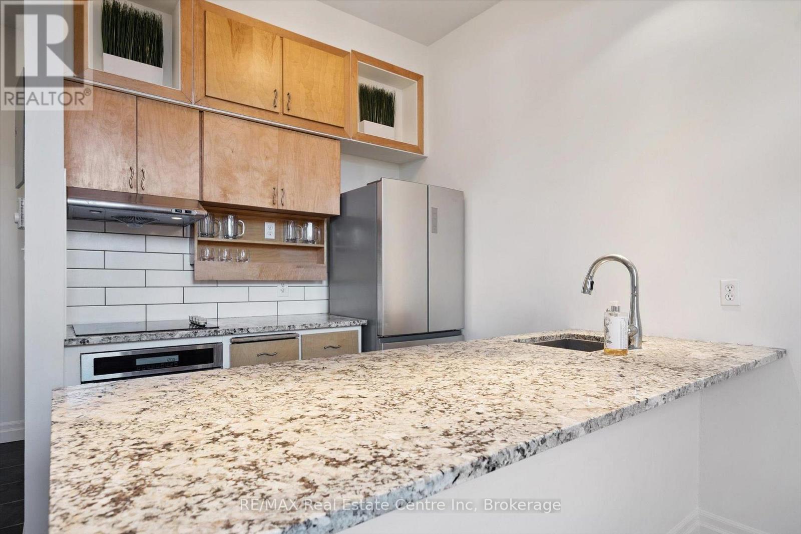 202 - 200 Woolwich Street, Guelph, Ontario  N1H 3V7 - Photo 4 - X12474909