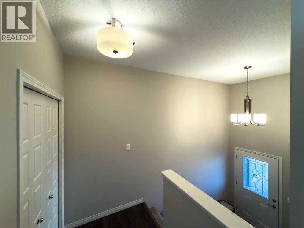 129 Henderson Crescent, Penhold, Alberta  T0M 1R0 - Photo 6 - A2265460