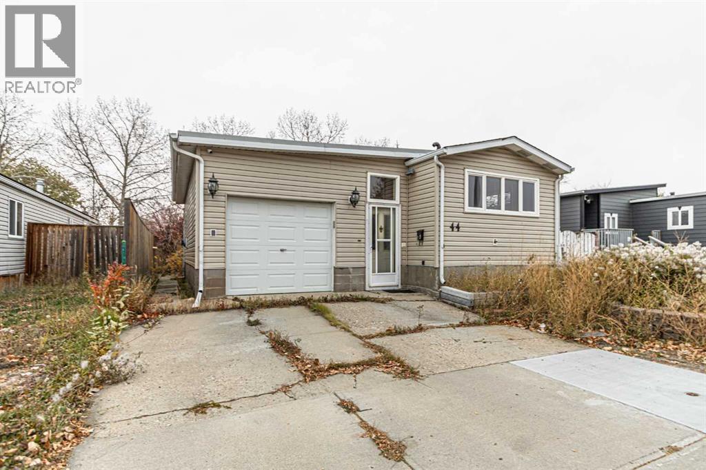 44 Spring Dale Circle Se, Airdrie, Alberta  T4A 1P2 - Photo 2 - A2265049