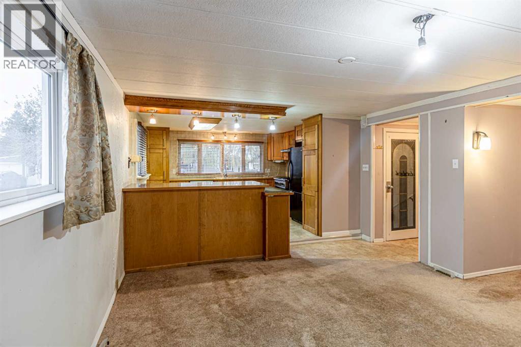 44 Spring Dale Circle Se, Airdrie, Alberta  T4A 1P2 - Photo 3 - A2265049