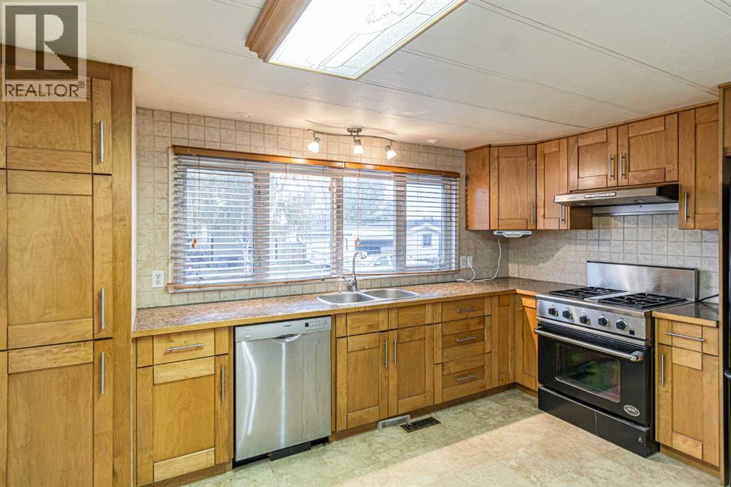 44 Spring Dale Circle Se, Airdrie, Alberta  T4A 1P2 - Photo 7 - A2265049