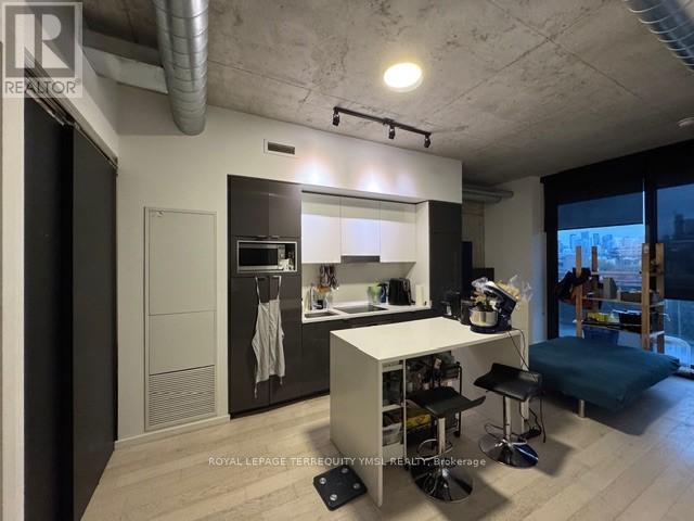 612 - 21 Lawren Harris Square, Toronto, Ontario  M5A 0T4 - Photo 2 - C12475042