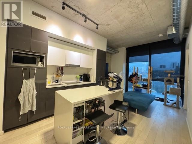 612 - 21 Lawren Harris Square, Toronto, Ontario  M5A 0T4 - Photo 3 - C12475042