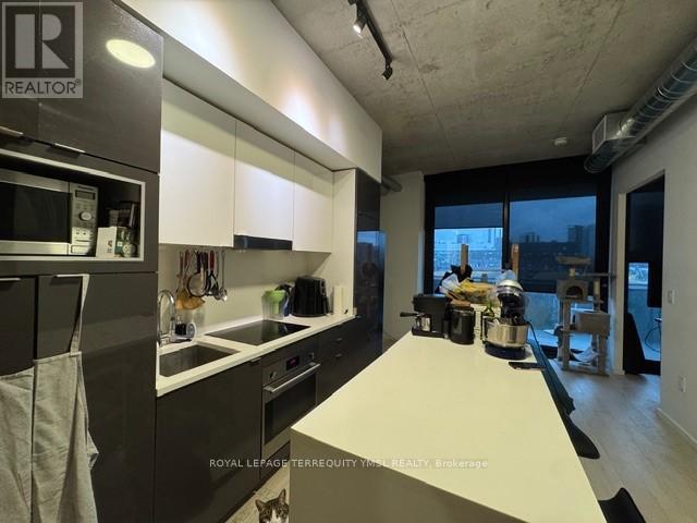 612 - 21 Lawren Harris Square, Toronto, Ontario  M5A 0T4 - Photo 4 - C12475042