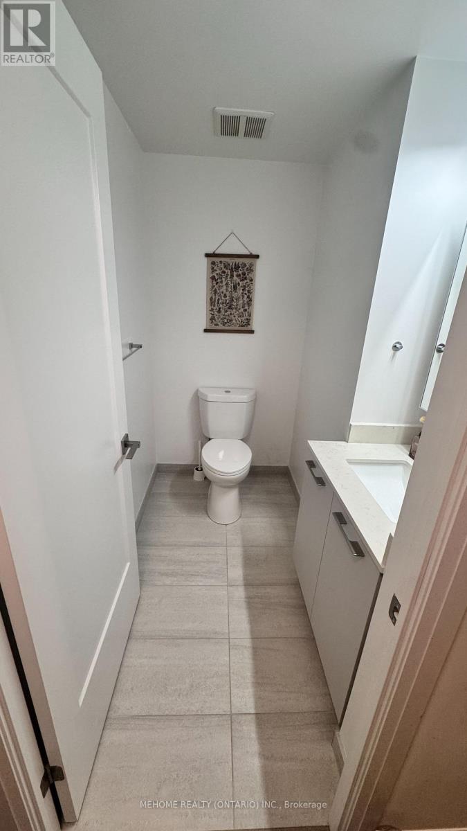 606 - 18 Water Walk Drive, Markham, Ontario  L3R 6L5 - Photo 7 - N12475169