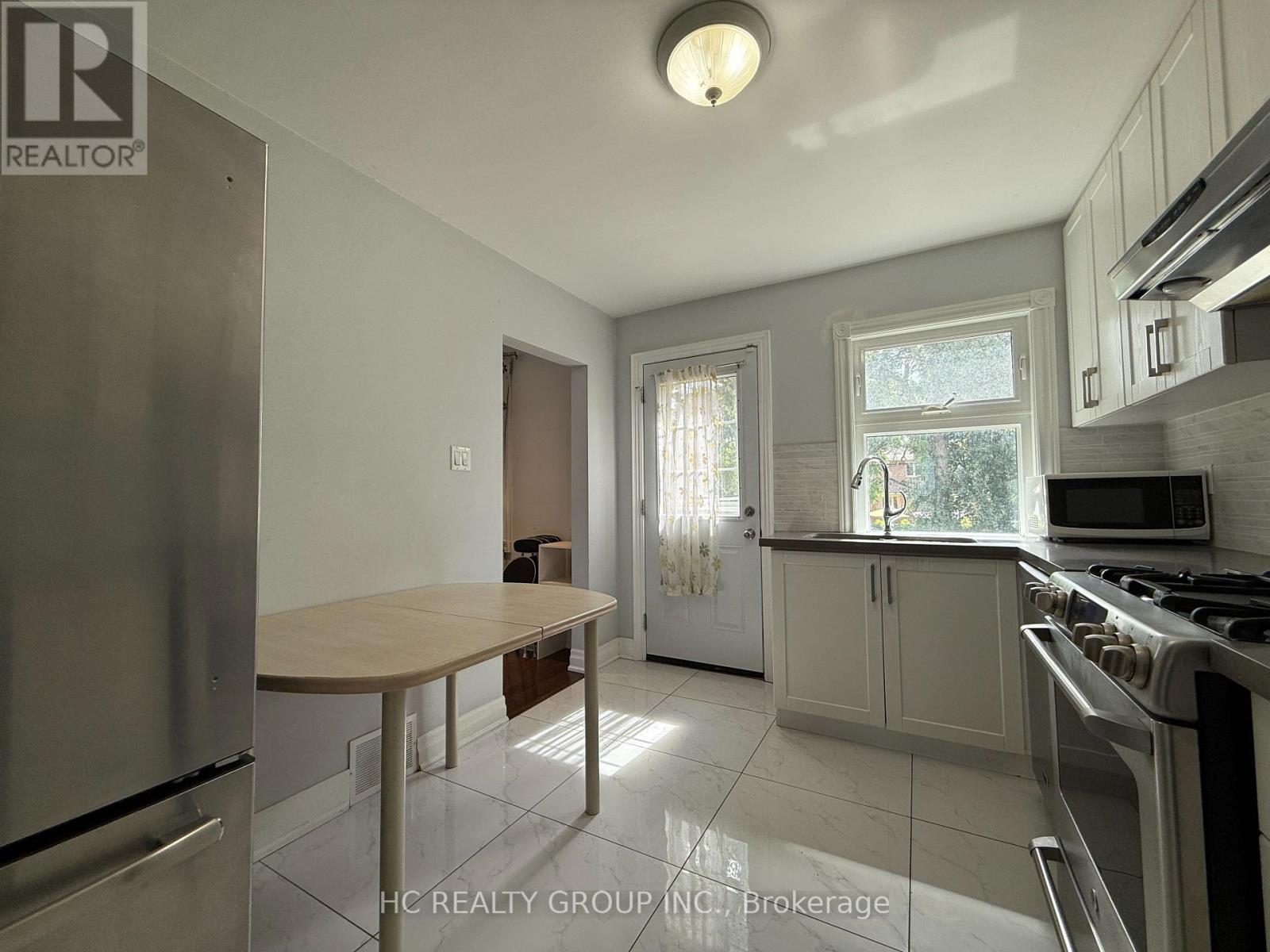 673 Glengrove Avenue W, Toronto, Ontario  M6B 2J2 - Photo 4 - W12475185
