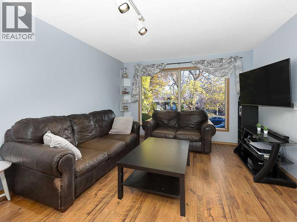 147 Berwick Way Nw, Calgary, Alberta  T3K 1B8 - Photo 7 - A2265034