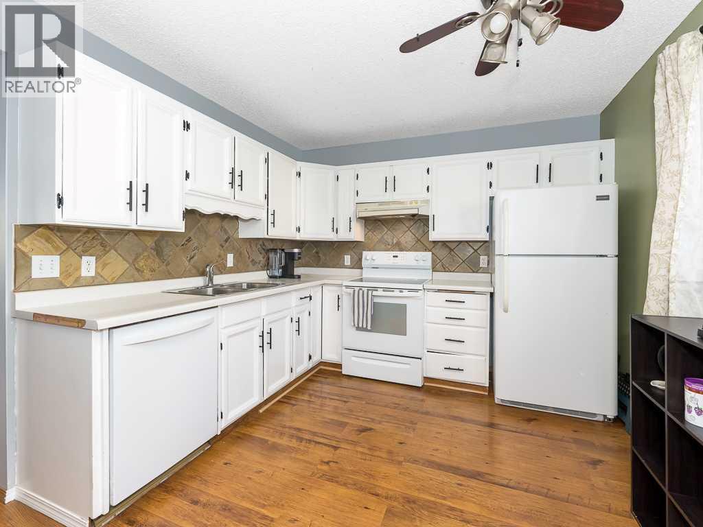 147 Berwick Way Nw, Calgary, Alberta  T3K 1B8 - Photo 11 - A2265034