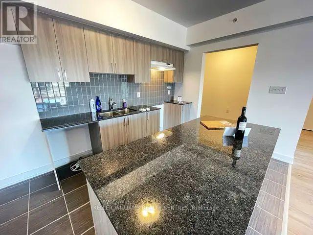 107 - 6 Spice Way, Barrie, Ontario  L9J 0J9 - Photo 1 - S12475198