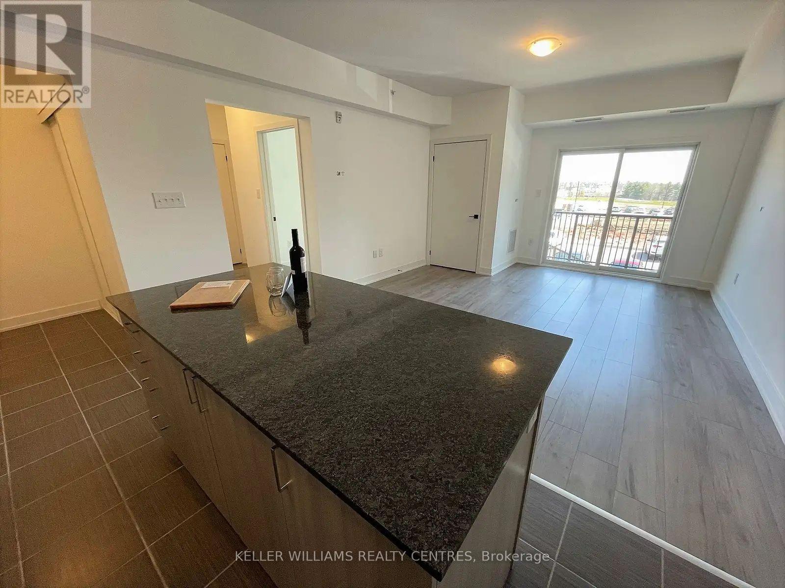 107 - 6 Spice Way, Barrie, Ontario  L9J 0J9 - Photo 2 - S12475198