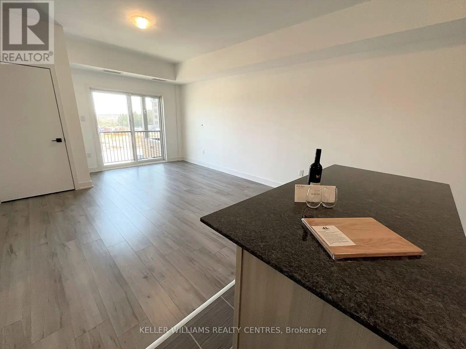 107 - 6 Spice Way, Barrie, Ontario  L9J 0J9 - Photo 6 - S12475198
