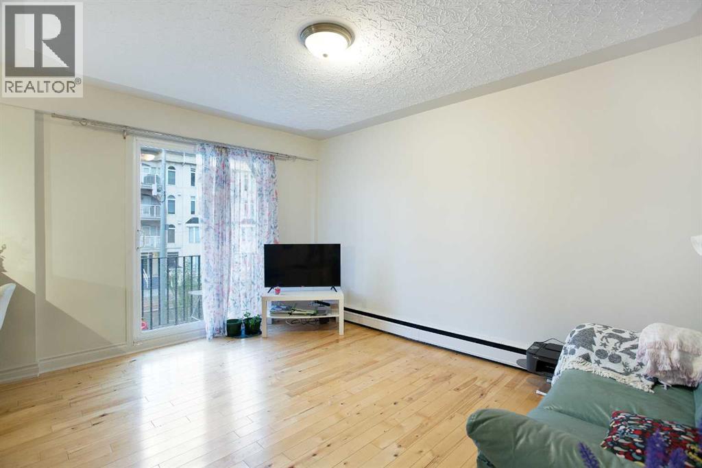 302, 1027 12 Avenue Sw, Calgary, Alberta  T2R 0J5 - Photo 2 - A2265154