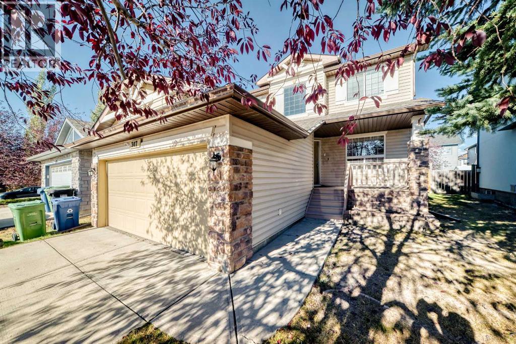 307 Panatella Court Nw, Calgary, Alberta  T3K 5Y1 - Photo 3 - A2265812