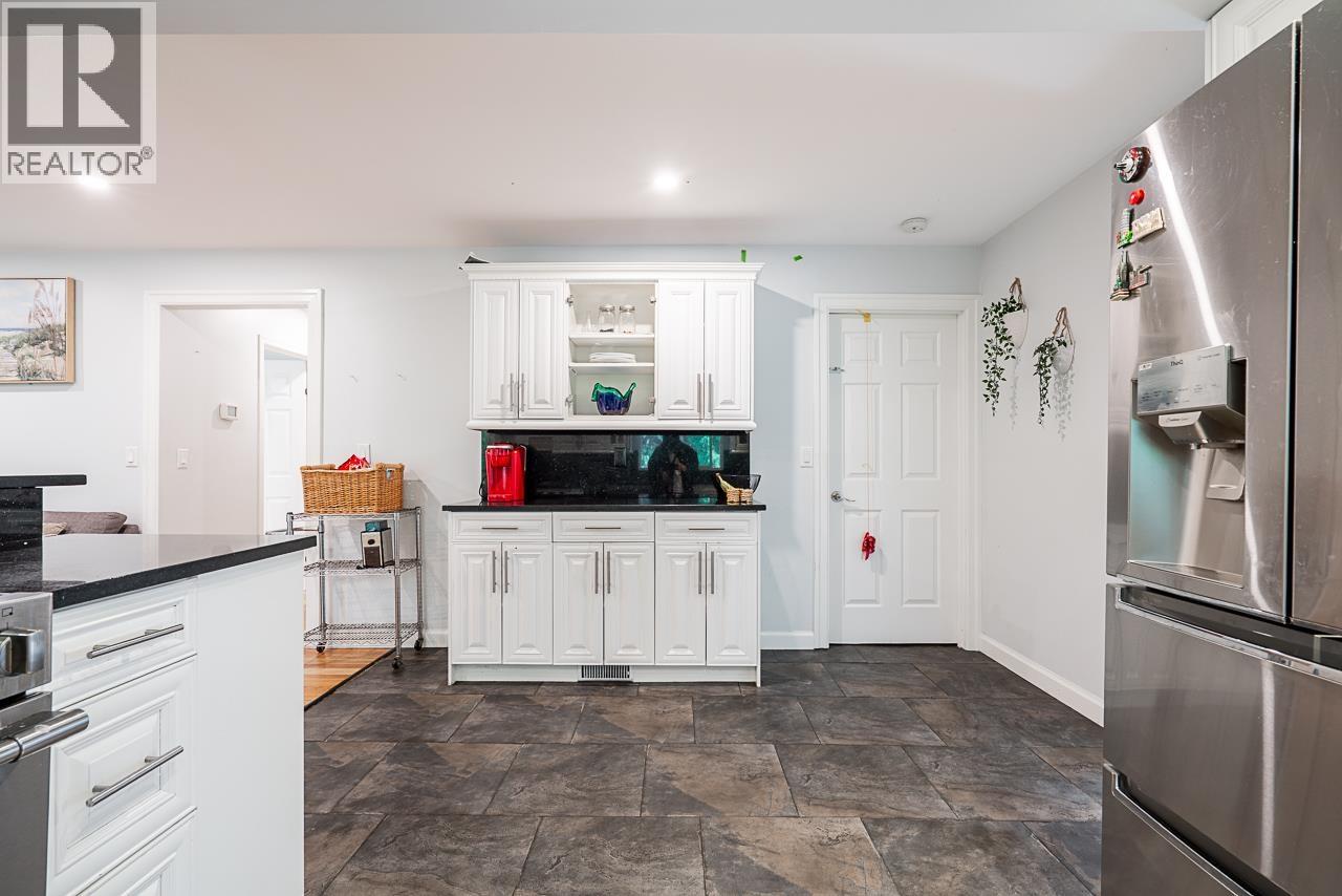 1402 Briarcliffe Drive, Coquitlam, British Columbia  V3E 1Z1 - Photo 7 - R3060847