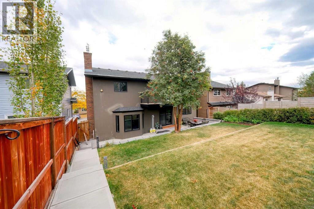 5039 Norris Road Nw, Calgary, Alberta  T2K 5R6 - Photo 3 - A2263821