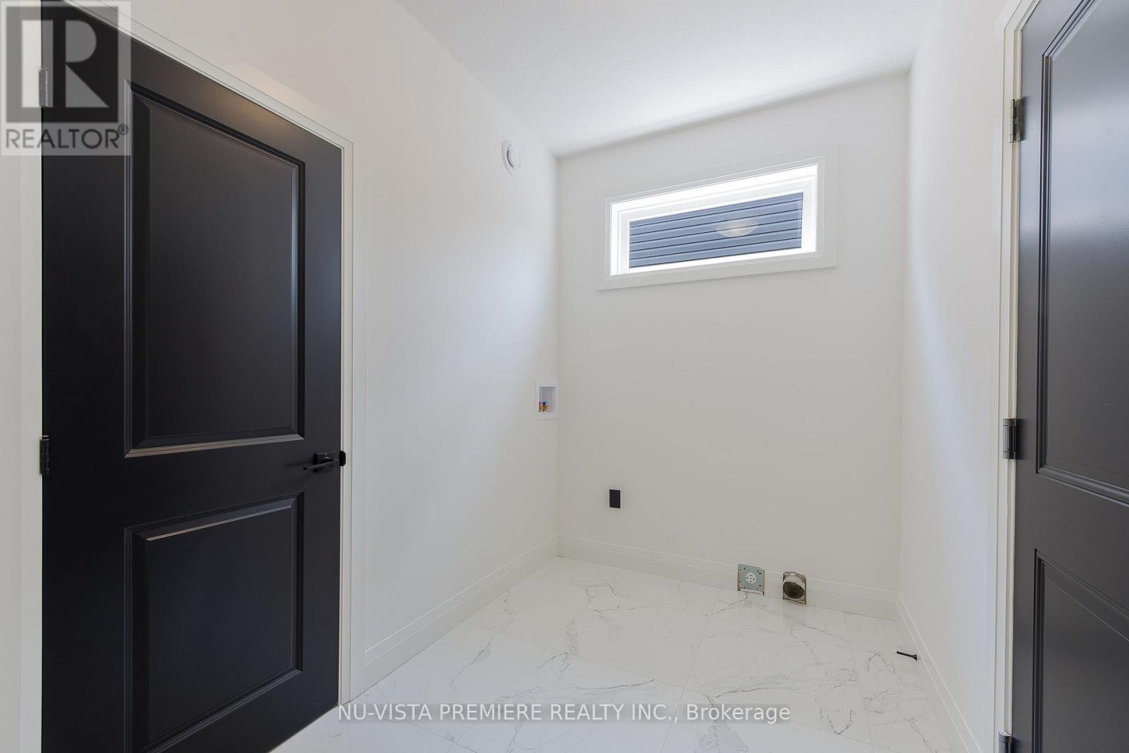 28 Basil Crescent, Middlesex Centre, Ontario  N0M 2A0 - Photo 22 - X12475693