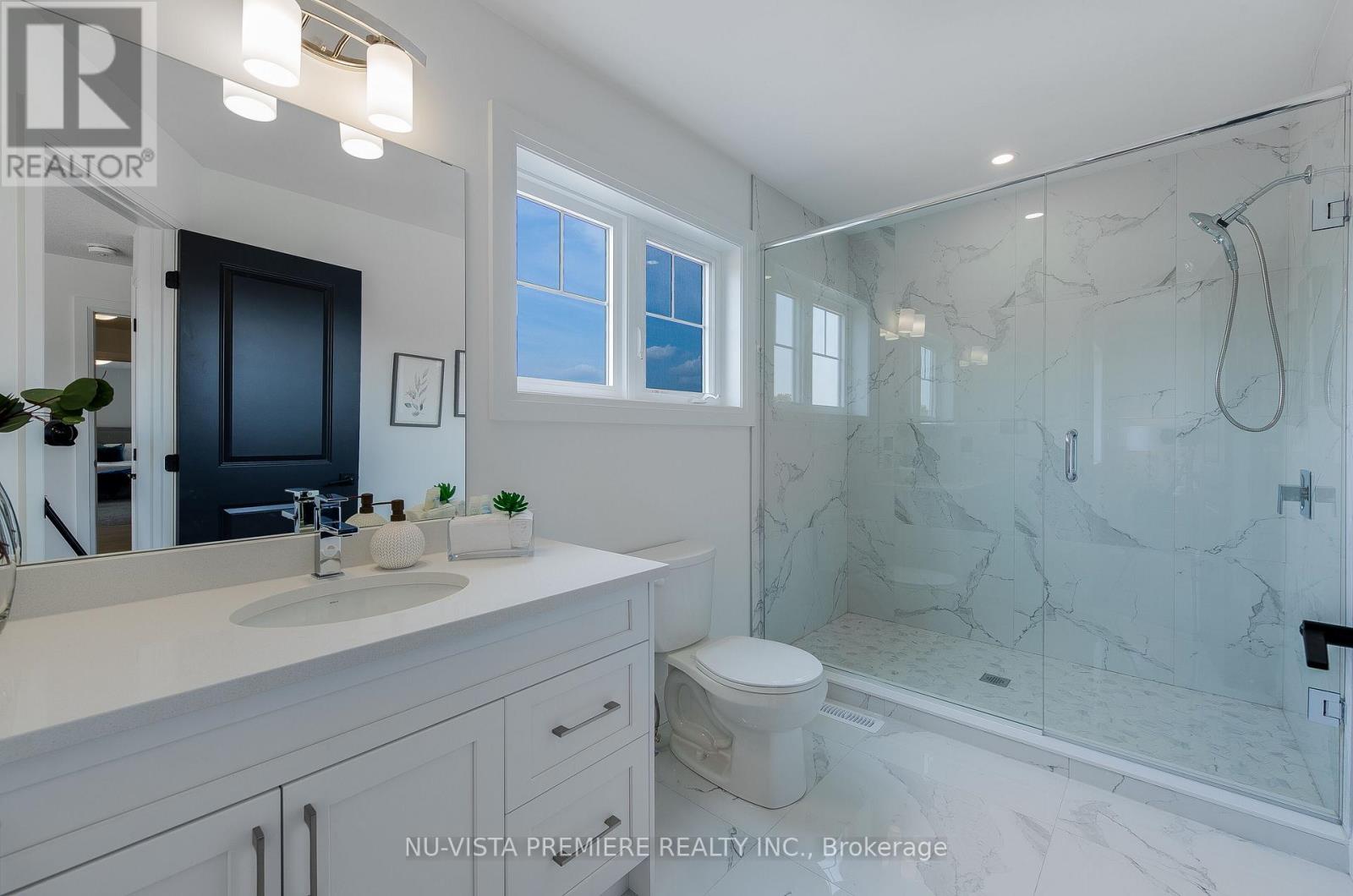 28 Basil Crescent, Middlesex Centre, Ontario  N0M 2A0 - Photo 33 - X12475693