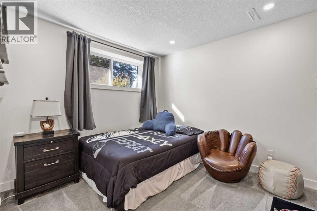 827 Canaveral Crescent Sw, Calgary, Alberta  T2W 1N3 - Photo 32 - A2264816