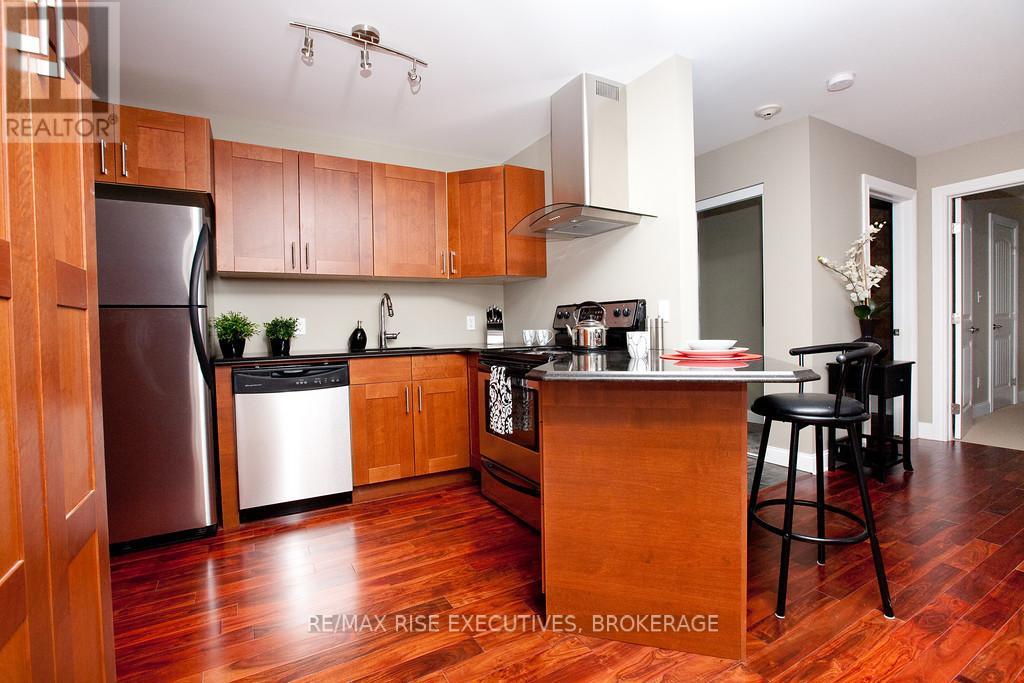 210 - 810 Blackburn Mews, Kingston (North Of Taylor-Kidd Blvd), Ontario  K7P 0H2 - Photo 3 - X12476037