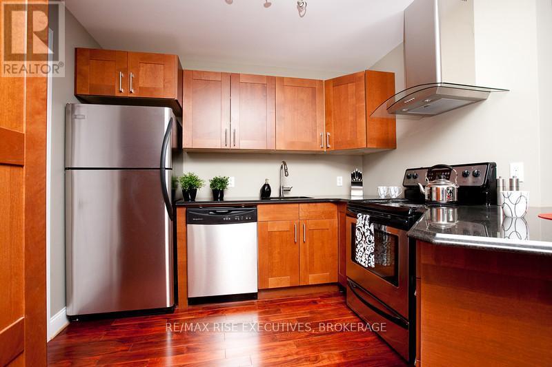210 - 810 Blackburn Mews, Kingston (North Of Taylor-Kidd Blvd), Ontario  K7P 0H2 - Photo 4 - X12476037