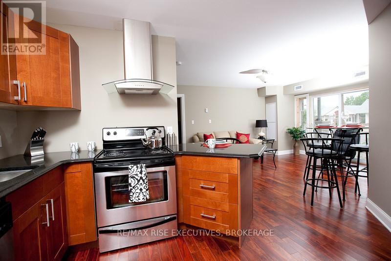 210 - 810 Blackburn Mews, Kingston (North Of Taylor-Kidd Blvd), Ontario  K7P 0H2 - Photo 5 - X12476037