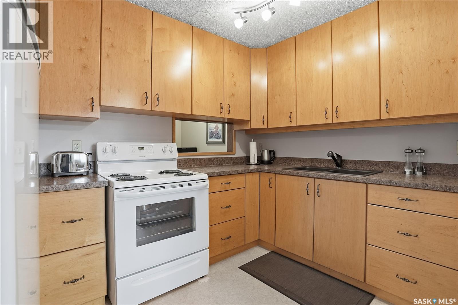 106 1128 Mckercher Drive, Saskatoon, Saskatchewan  S7H 4Y7 - Photo 3 - SK021464