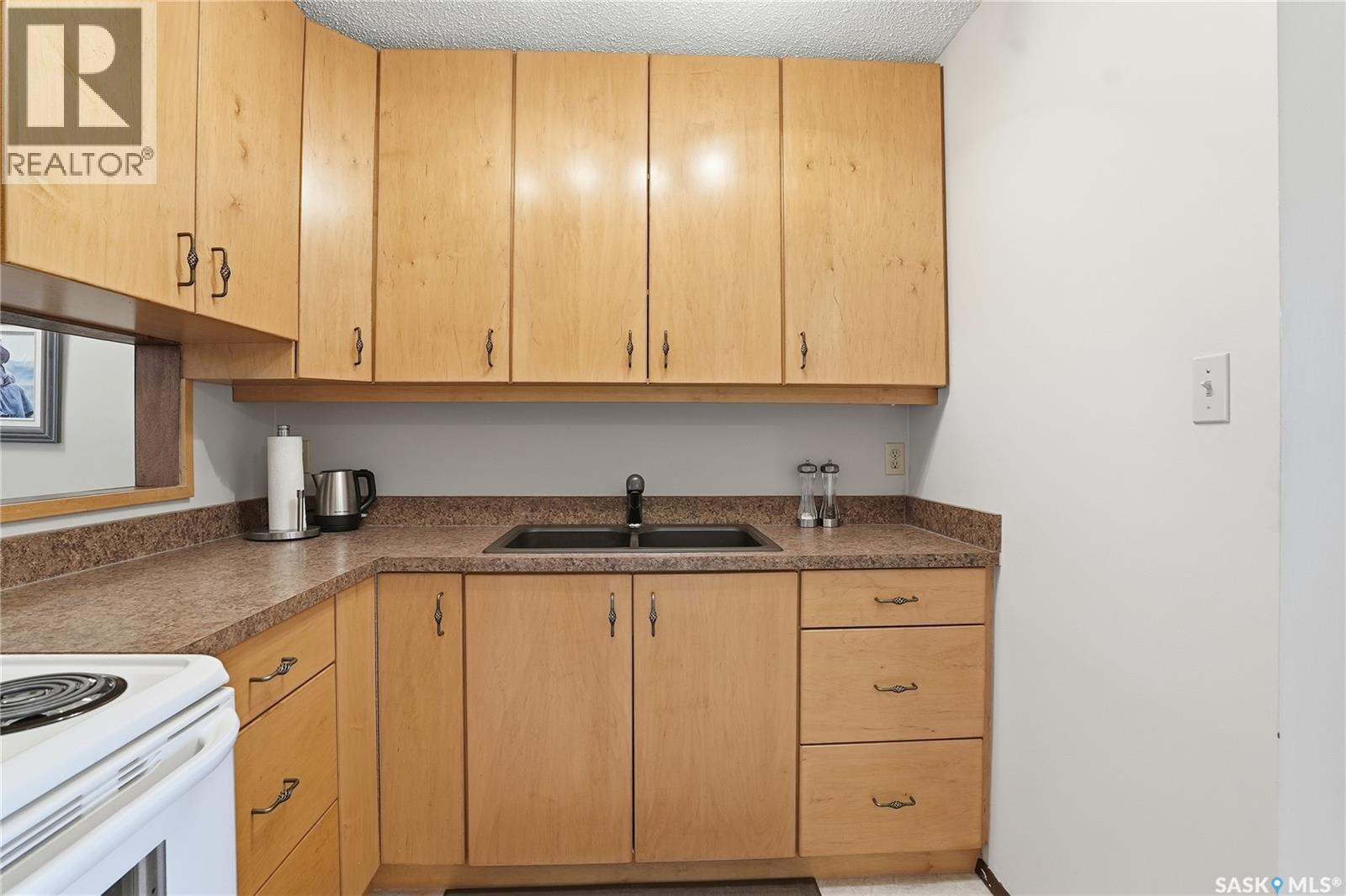 106 1128 Mckercher Drive, Saskatoon, Saskatchewan  S7H 4Y7 - Photo 4 - SK021464