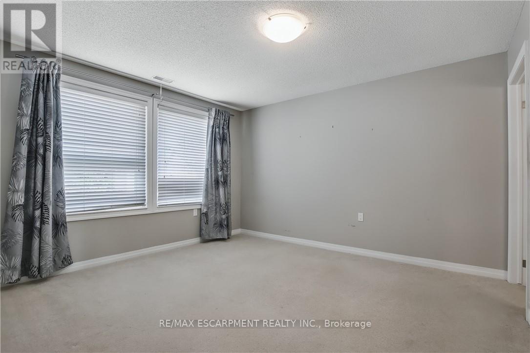 5 Archdeacon Clark Trail, Hamilton (Kennedy), Ontario  L9B 2M2 - Photo 17 - X12475934
