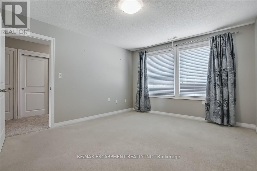 5 Archdeacon Clark Trail, Hamilton (Kennedy), Ontario  L9B 2M2 - Photo 18 - X12475934