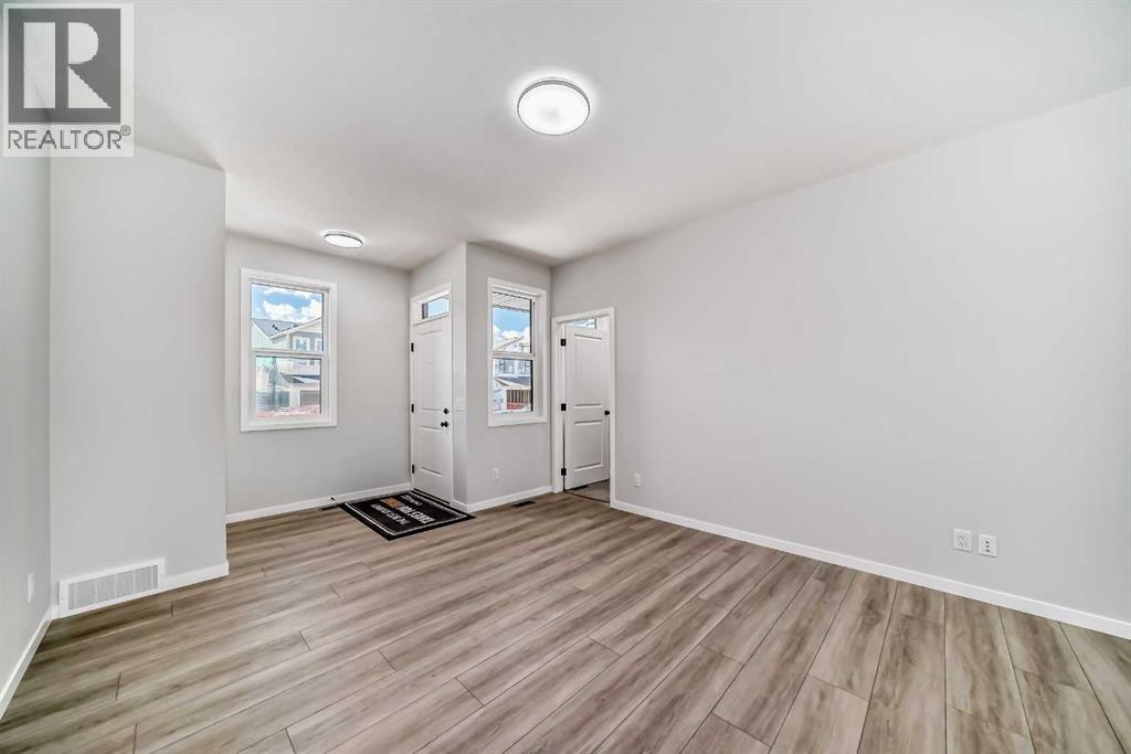 208 Lucas Place Nw, Calgary, Alberta  T3P 2E6 - Photo 5 - A2210904