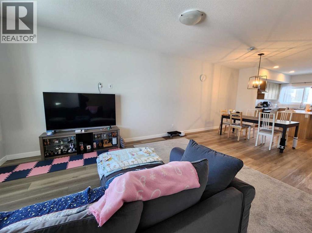 99 Edith Passage Nw, Calgary, Alberta  T3R 2B5 - Photo 7 - A2226472