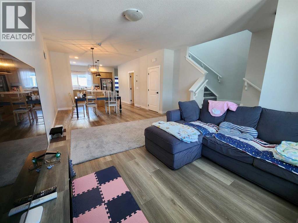 99 Edith Passage Nw, Calgary, Alberta  T3R 2B5 - Photo 5 - A2226472