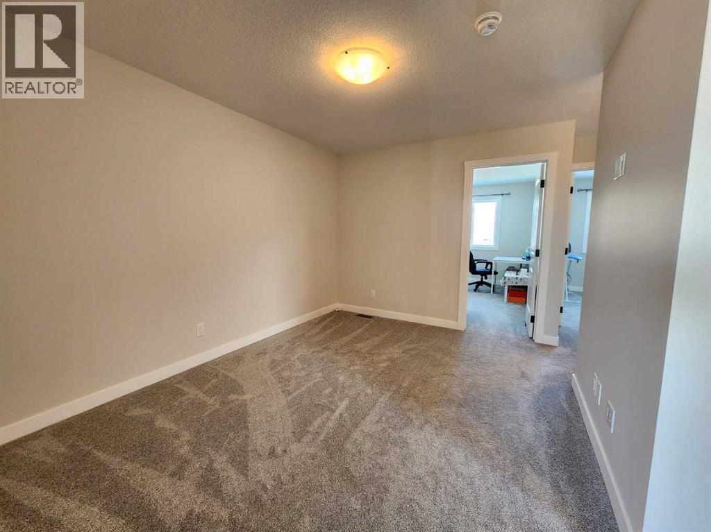 99 Edith Passage Nw, Calgary, Alberta  T3R 2B5 - Photo 27 - A2226472