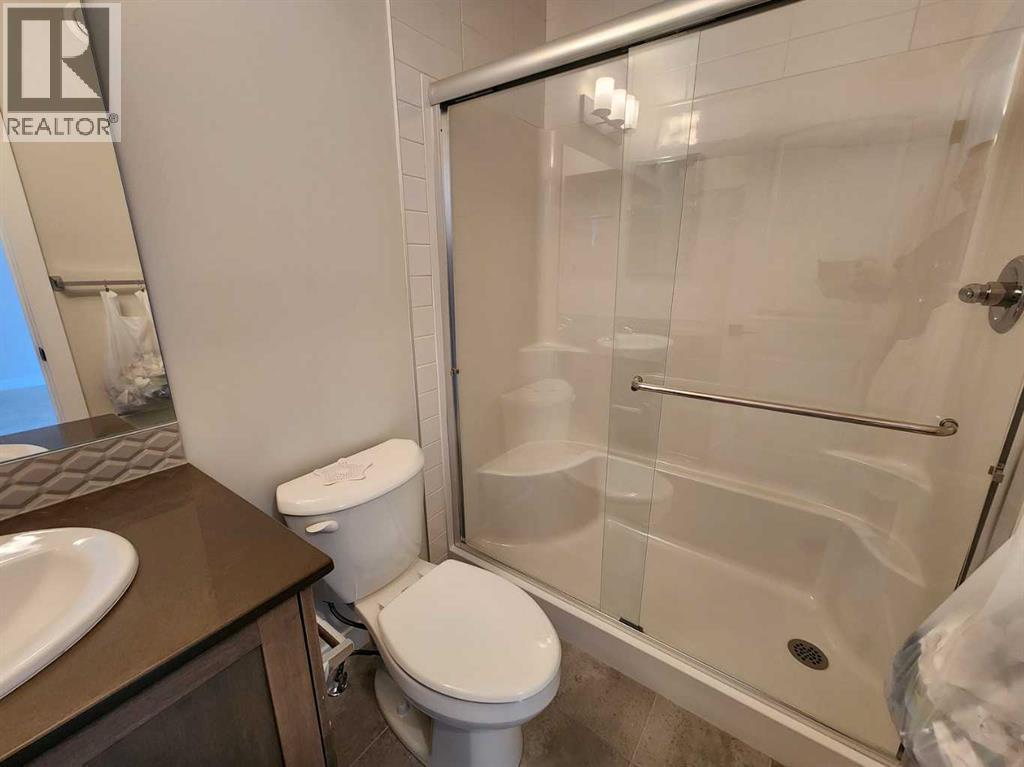 99 Edith Passage Nw, Calgary, Alberta  T3R 2B5 - Photo 38 - A2226472