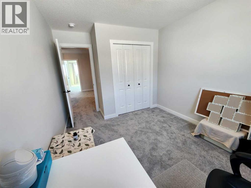 99 Edith Passage Nw, Calgary, Alberta  T3R 2B5 - Photo 34 - A2226472