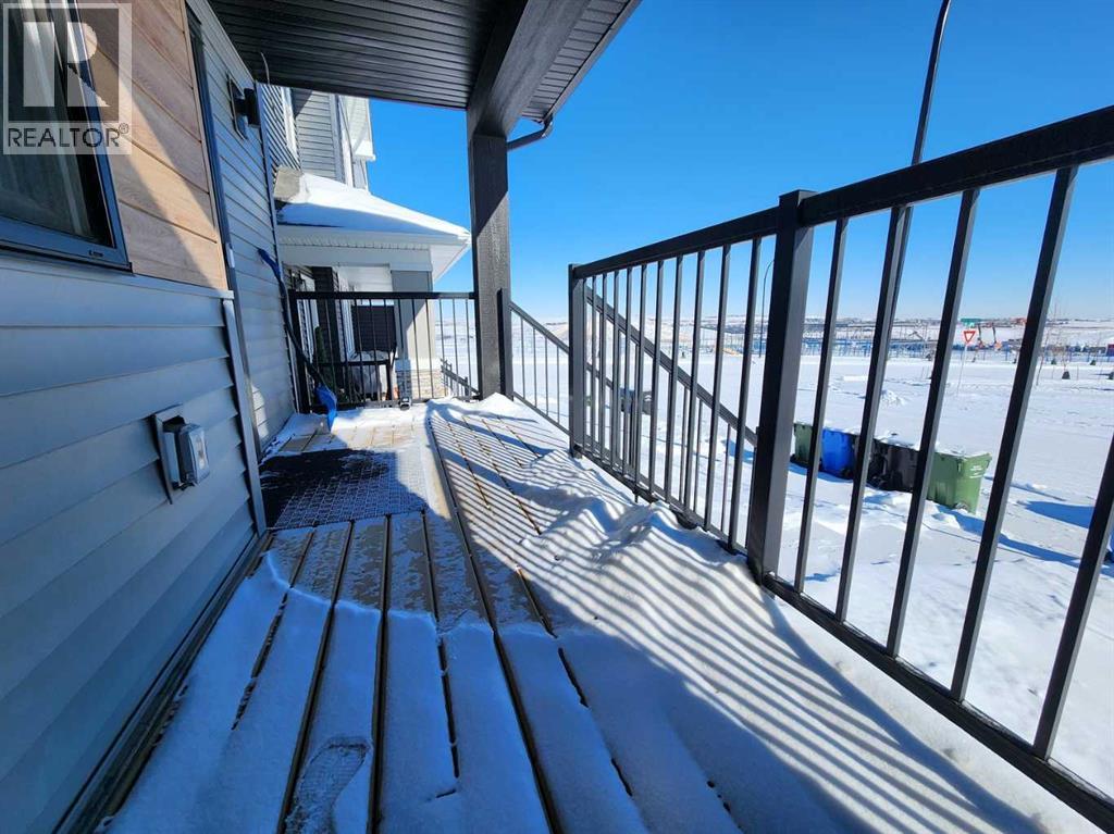 99 Edith Passage Nw, Calgary, Alberta  T3R 2B5 - Photo 3 - A2226472