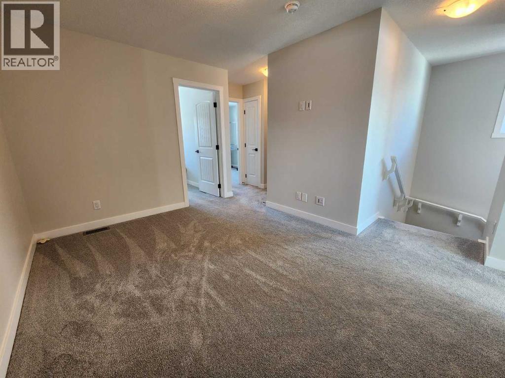 99 Edith Passage Nw, Calgary, Alberta  T3R 2B5 - Photo 28 - A2226472